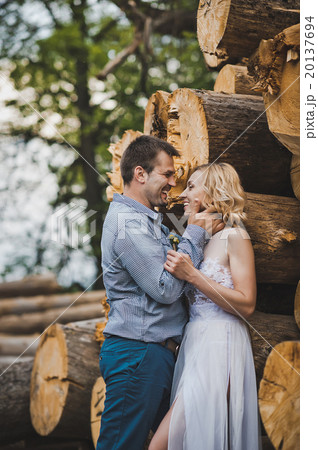 Walk of a newly-married couple about logs 3241. Walk of a newly-married couple about logs 3241. 20137694