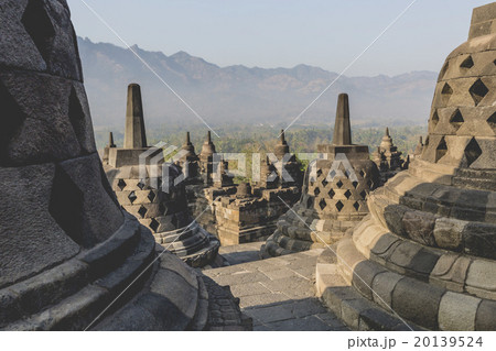 Buddist temple Borobudur on sunset background.  20139524