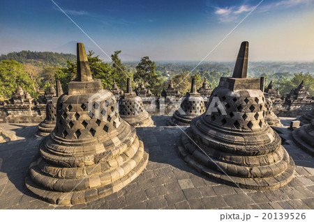 Buddist temple Borobudur on sunset background. Buddist temple Borobudur on sunset background. 20139526
