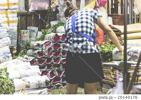 Local woman sells Thai rose at a market  20140176