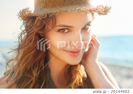 Beautiful girl on a beach Beautiful girl on a beach 20144002