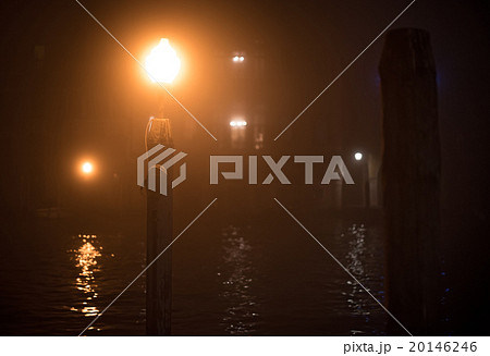 Lantern on a wooden pole in Venice at night 20146246