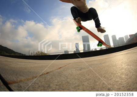 skateboarder skateboarding at city 20152358