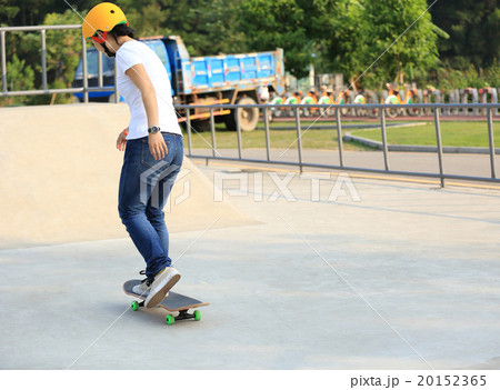 skateboarding woman at skatepark 20152365