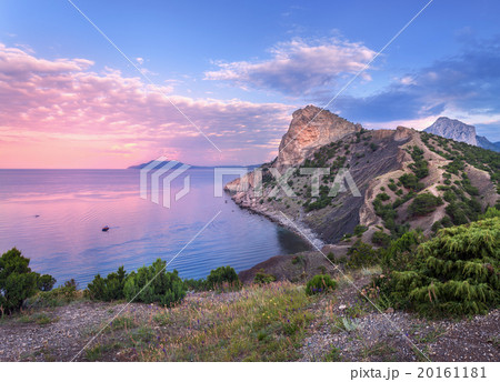 Beautiful summer sunset at the sea with mountains Beautiful summer sunset at the sea with mountains 20161181