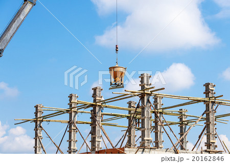 Worker working in construction on blue sky Worker working in construction on blue sky 20162846