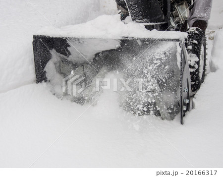 Snowblower at work on a winter day 20166317