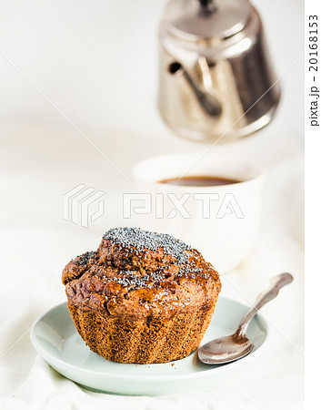 vegan muffin with carob, raisins and poppy seeds vegan muffin with carob, raisins and poppy seeds 20168153