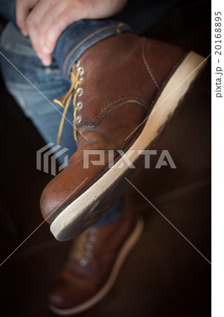 brown boot leather shoes and jean pants clothing brown boot leather shoes and jean pants clothing 20168895