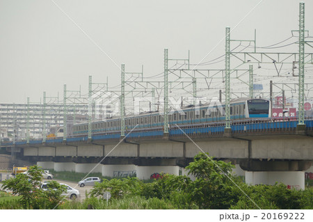 京浜東北線 E233系 多摩川の写真素材