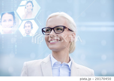 young smiling businesswoman in eyeglasses outdoors 20170450