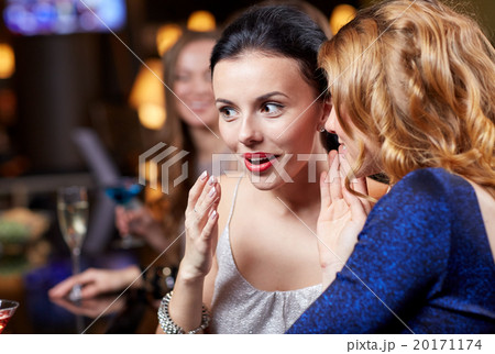 happy women with drinks at night club happy women with drinks at night club 20171174