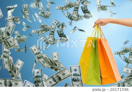 close up of female hand holding shopping bags 20171596