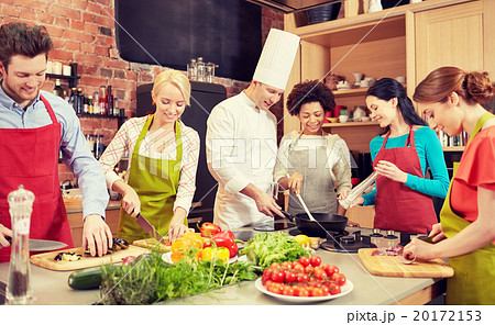happy friends and chef cook cooking in kitchen 20172153