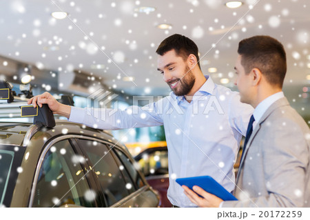 happy man with car dealer in auto show or salon 20172259