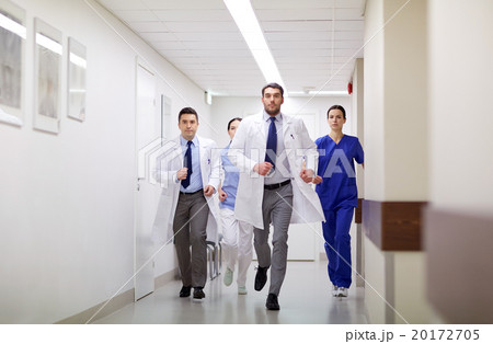 group of medics walking along hospital 20172705