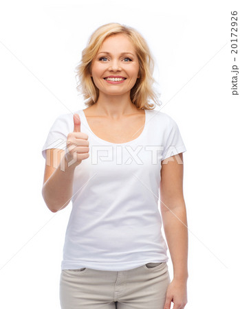smiling woman in white t-shirt showing thumbs up 20172926