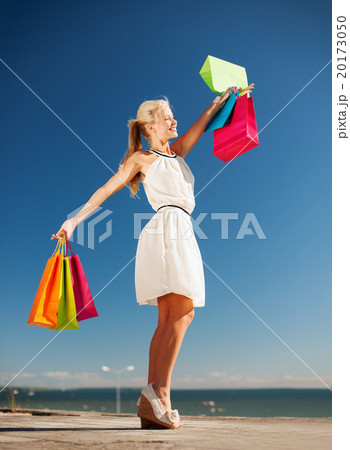 woman with shopping bags woman with shopping bags 20173050