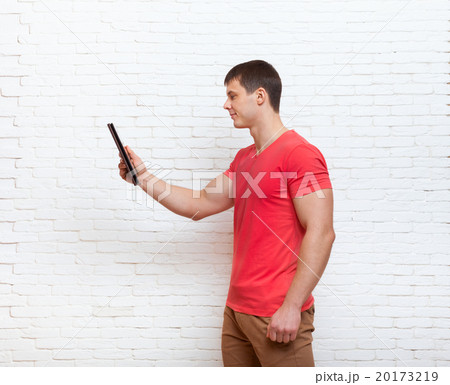 Casual Man Using Tablet Computer Social Network 20173219