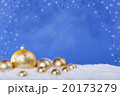 gold Christmas balls in the snow 20173279