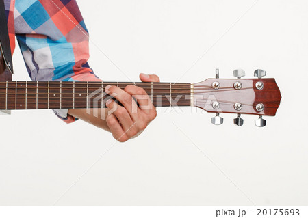 Fingerboard of guitar and hand playing guitar. Fingerboard of guitar and hand playing guitar. 20175693