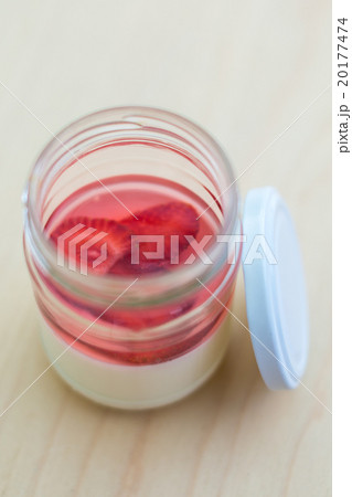 Beautiful strawberry dessert in jar on light Board 20177474
