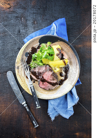 Roast Boar Steak with potato and Salad 20178072