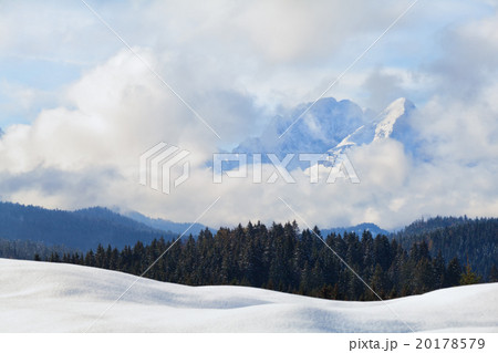 mountain peaks in clouds during winter 20178579