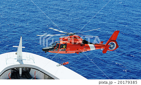 Rescue helicopter next to ship 20179385