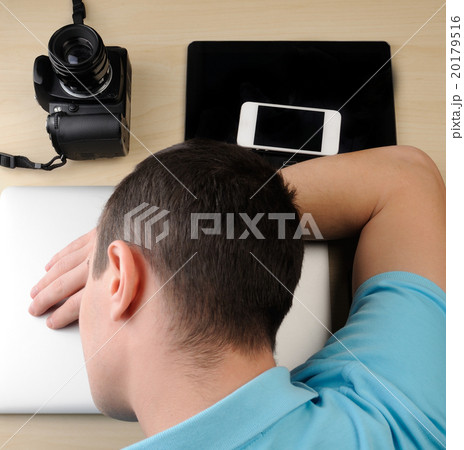 Person sleep on gadgets Person sleep on gadgets 20179516