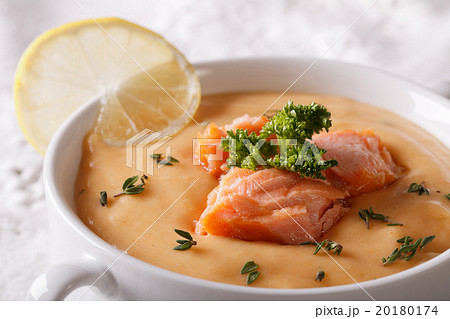 Salmon soup with lemon macro in a bowl. horizontal Salmon soup with lemon macro in a bowl. horizontal 20180174