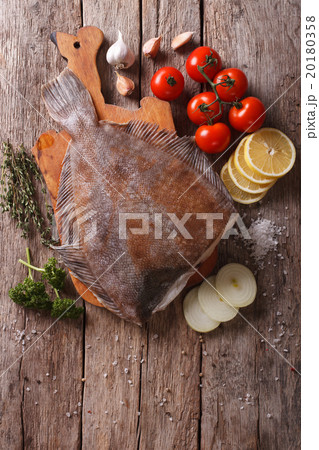 raw flounder with ingredients on a table 20180358