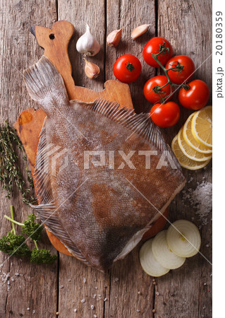 raw flounder with ingredients on a table 20180359
