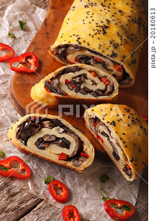 Potato roll stuffed with wild mushrooms closeup Potato roll stuffed with wild mushrooms closeup 20180613