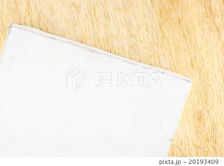 Top view of Blank old dirty canvas on wood table Top view of Blank old dirty canvas on wood table 20193409