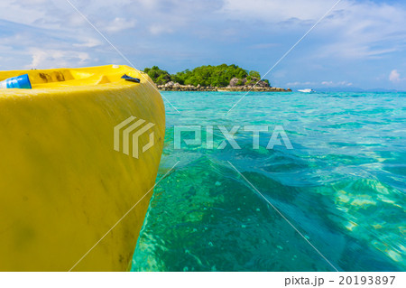 Paddling yellow kayak into the Andaman sea 20193897