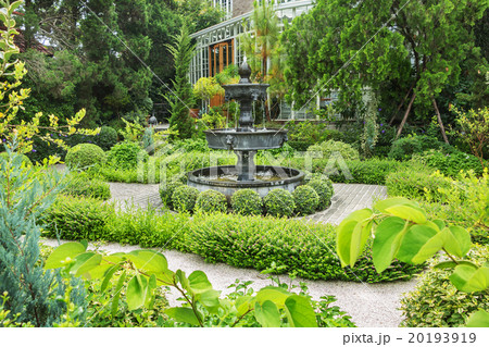 Fountain in english garden design. Fountain in english garden design. 20193919