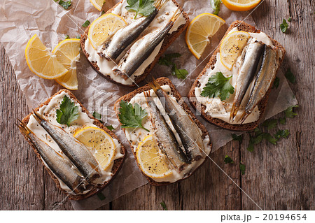 Sandwiches with sprats, cream cheese close-up 20194654