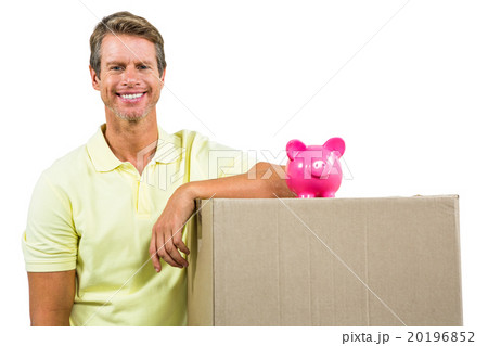 Smiling man by box 20196852