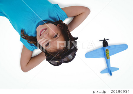 Smiling girl laying on the floor 20196954