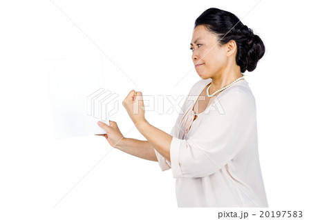 Angry woman shaking her fist 20197583