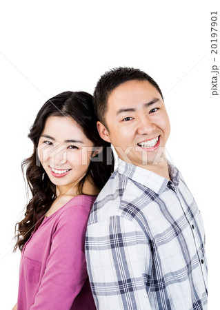 Smiling asian couple looking at camera 20197901