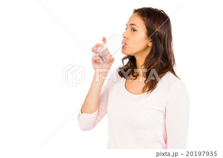 Gorgeous woman drinking a glass of water 20197935