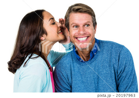 Woman sharing secret with man 20197963