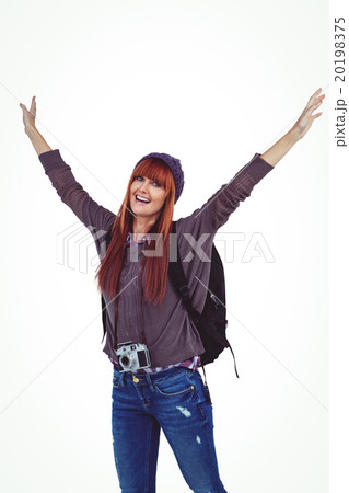 Smiling hipster woman with hands up 20198375
