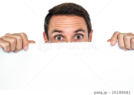 Man holding blank sheet  20199081