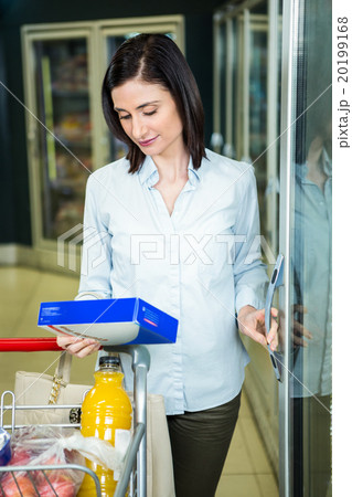 Pretty woman holding a box 20199168