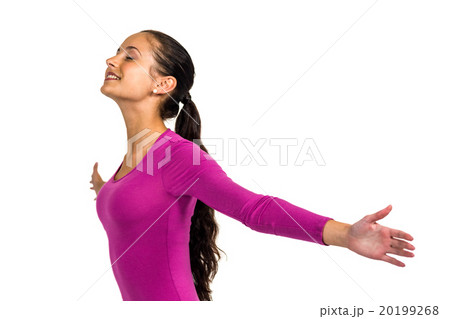 Smiling woman with arms outstretched with eyes closed Smiling woman with arms outstretched with eyes closed 20199268