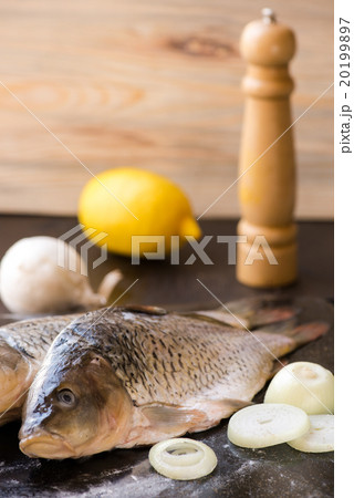 fresh carp fish with spices and lemon fresh carp fish with spices and lemon 20199897