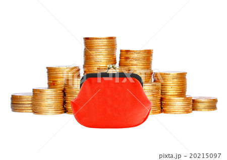 Many coins in column and red purse isolated 20215097